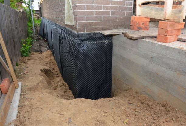 Happy homeowners after waterproofing job in Fultondale